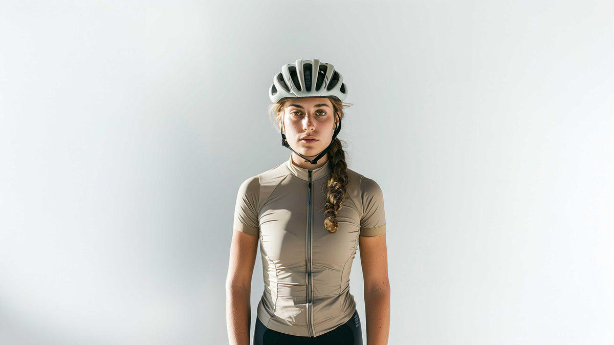 Cyclist wearing a helmet and cycling kit