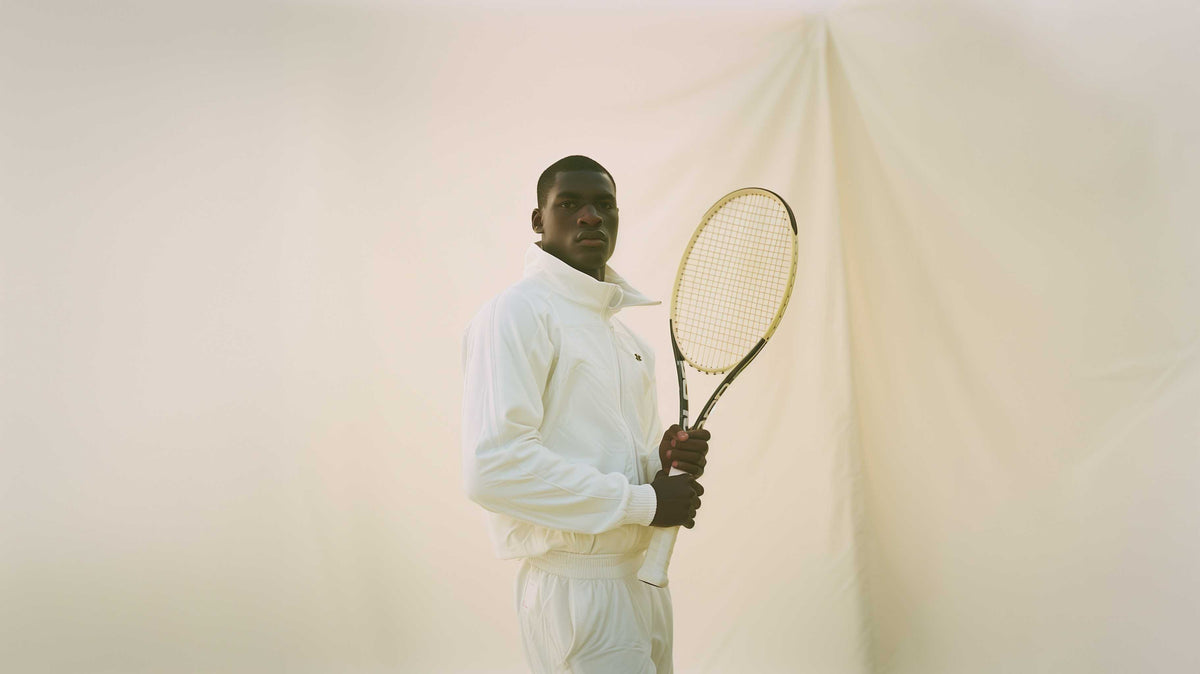 Tennis player holding a racket on court